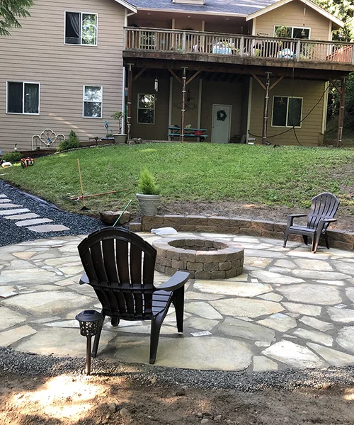 Flastone wet small block wall and fire pit in Kent
